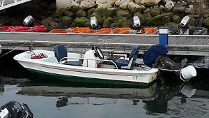 DORY 10' WITH OUTBOARD AND TRAILER