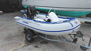 Rib Loadstar 285 with jocky console and electric start 15hp mercury on remotes