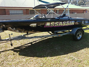 Lewis ski boat inboard V8 with ski gear and equipment.