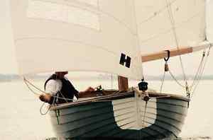 Clinker built wooden sailing boat, gaff rigged classic yacht, wooden dinghy