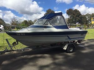 STREAKER 5.02 CUDDY FISHING BOAT WITH 70HP EVINRUDE ON NUMA TRAILER