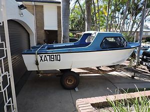 15 foot Half Cabin boat and Trailer