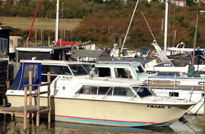 Birchwood 25 spacious live aboard houseboat on a scenic mooring