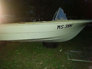 15 foot fiberglass boat/ boat trailer