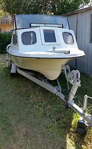 1980's stur craft boat with 70hp seahorse 2 stroke johnson motor