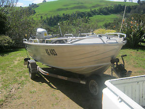 14 ft aluminium boat with new Honda 4 stroke 30 hp engine