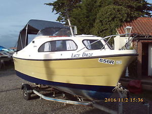 SHETLAND SPEEDWELL CRUISER WITH EVINRUDE 25HP OUTBOARD AND FULL CANOPY