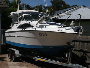 1986 Sea-Ray  240 Weekender Cruiser boat  (must be sold)