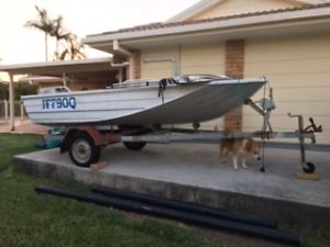 Aluminium Tinny with 15hp Honda 4 strock electric start motor with trailer.