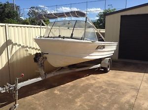 Quintrex aluminium boat with 30 hp Yamaha outboard motor  2006 model on trailer.
