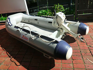 INFLATABLE BOAT WITH MOTOR  3.1 m  WITH 4HP JOHNSON OUTBOARD AND AIRDECK FLOOR