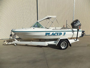 BERTRAM CARIBBEAN SKI BOAT (PLACID 11) EVINRUDE V6  150 HP OUTBOARD.TRAILER