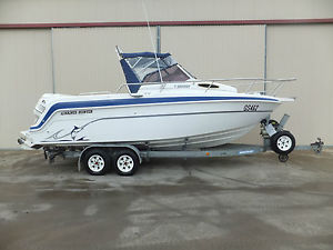2000 HAINES HUNTER 680F ENCORE OFFSHORE FISHING BOAT.EVINRUDE 200 HP TRAILER