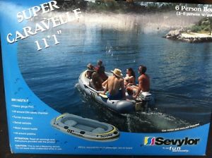 6 person inflatable new boat, can take up to 32HP outboard motor