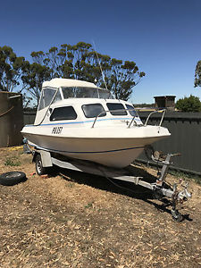 Swift Craft 4.7m - 65 Mercury on Tilt trailer.