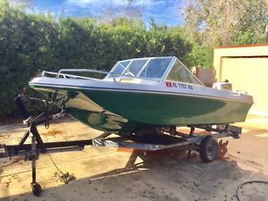 Classic 1972 Tiki Winner Boat with Trailer and 70 HP Johnson Outboard Motor