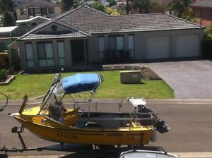 5M EXPRESS CUDDY CAB POWERED BY A YAMAHA FOUR STROKE 60hp