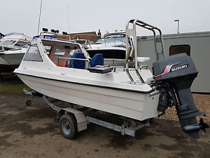 CRUISER/ FISHING/ DAY BOAT/ TRAILER/ 55HP AUTOLUBE SUZUKI OUTBOARD