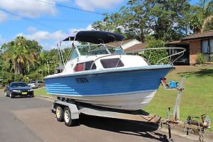 fiberglass Easyrider 5.98 run about out board boat tandem trailer