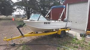 Savage 4.3 tiny with 20Hp Mariner outboard plus tilt trailer