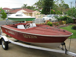 open runabout and trailer