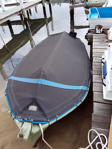 Putt Putt.  Original timber 14' dinghy with Simplex engine.