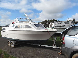 TIDY GRP TWIN CABINED CRUISER COMPLETE WITH A 20HP ENGINE AND TRAILER