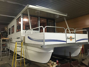 Catamaran  Cruiser Houseboat 10'x34' with trailer and 100 mariner