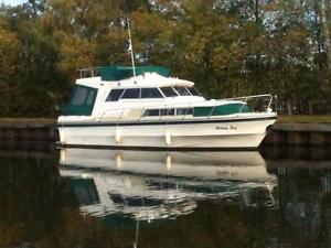 BIRCHWOOD 33 FLYBRIDGE SPORTSMAN  POWER CRUISER/BOAT