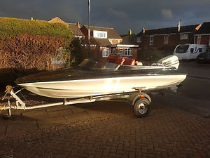 Speedboat with engine and trailer