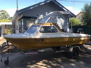 half cabin ski/fishing boat