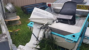 Small boat with Johnson outboard