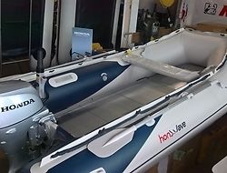 Honwave T32 IE Inflatable hull with 15HP Honda and brand new SBS Trailer