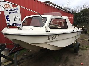 CJR 14 FISHING BOAT FITTED WITH A 40 HP EVINRUDE OUTBOARD ENGINE