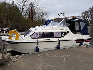 Shetland 4 plus 2 cabin cruiser/ powerboat complete with trailer