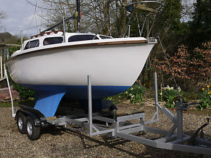 Sunstar 18 yacht  with 4 wheel trailer and 7.5HP outboard