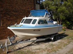 Savage Tasman fibreglass boat with Johnson 70hp motor