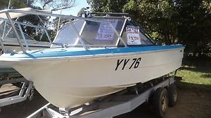 FISHING BOAT AND TRAILER