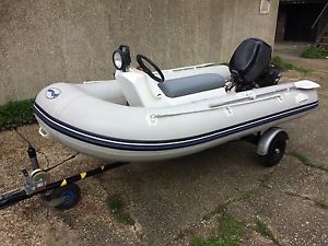 RIGID HULL RIB INTLATABLE BOAT,TENDER,FISHING 9.9 OUTBOARD ENGINE. SNIPE TRAILER