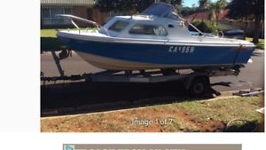 4.9mtr Half Cabin with 115hp Evinrude motor