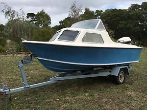 Stejcraft 4.5m half cab retro boat and trailer.
