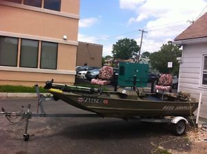 1997 BASS boat / 2005 trailer / 9.9HP johnson / RUNS GOOD/ No RESERVE /
