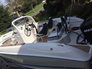 QUICKSILVER  600  + MERCURY 4-STROKE - NEW 2006 CUDDY CABIN BOAT