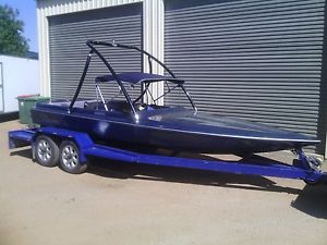 Ski Boat 350 Chev great social boat with bimini and wake tower.