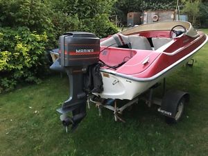 Picton red speed boat with trailer for skiing