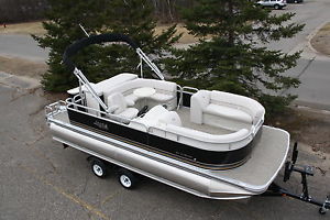 New 21 ft Tritoon pontoon boat with 150 and trailer