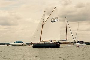 Clinker build wooden dinghy, classic sailing boat