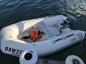 Inflatable boat,  trailer and outboard motor 8 HP