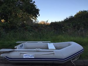 WAVELINE INFLATABLE BOAT WITH SUZUKI OUTBOARD.used once