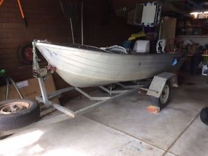 3.8m Aluminium Tinnie 15 HP Johnston Outboard on trailer